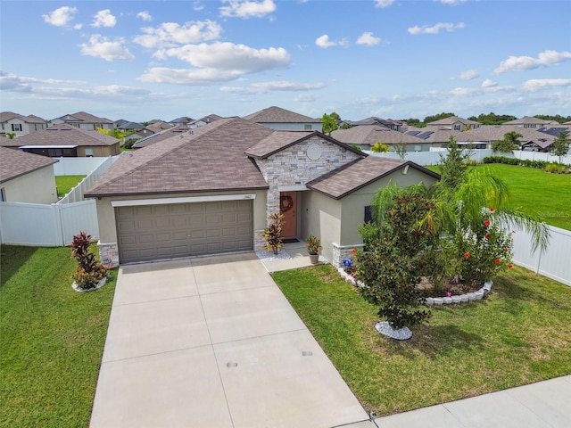 ranch-style house with a front yard and a garage