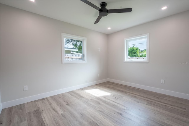 empty room featuring light hardwood / wood-style floors and ceiling fan