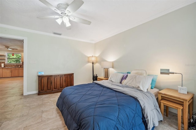 bedroom featuring crown molding, baseboards, visible vents, and ceiling fan