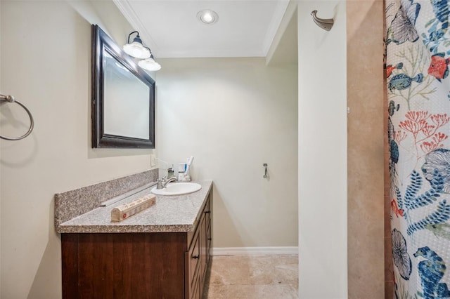 bathroom featuring a shower with shower curtain, vanity, crown molding, and baseboards