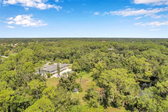 bird's eye view featuring a view of trees