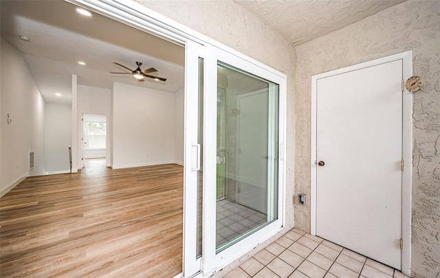 bathroom with baseboards, visible vents, a ceiling fan, wood finished floors, and recessed lighting