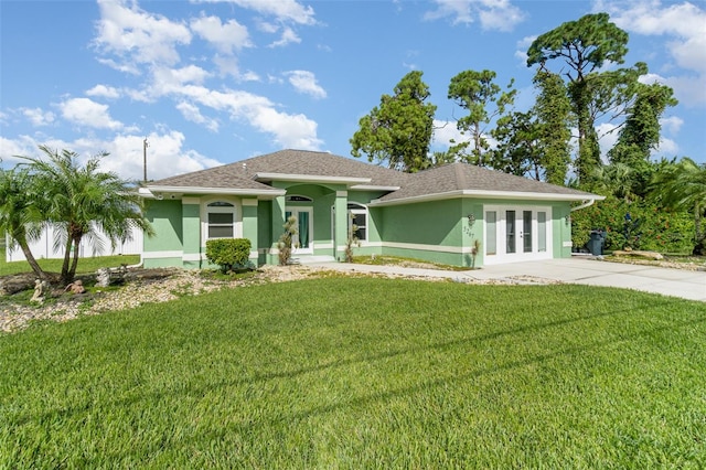 ranch-style home featuring a front lawn