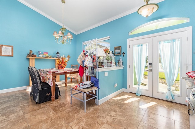 interior space with a notable chandelier, lofted ceiling, french doors, and crown molding