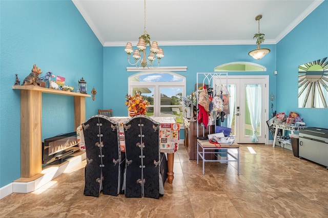 dining room with french doors, an inviting chandelier, and crown molding