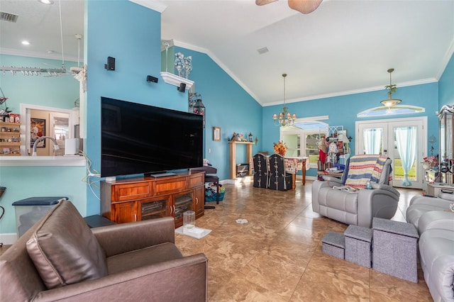 living room featuring ceiling fan with notable chandelier, ornamental molding, french doors, and high vaulted ceiling