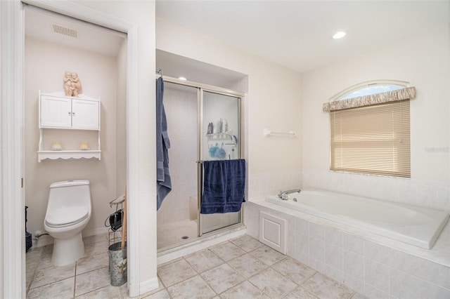 bathroom featuring separate shower and tub, tile patterned flooring, and toilet