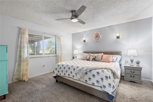 carpeted bedroom with ceiling fan and a textured ceiling