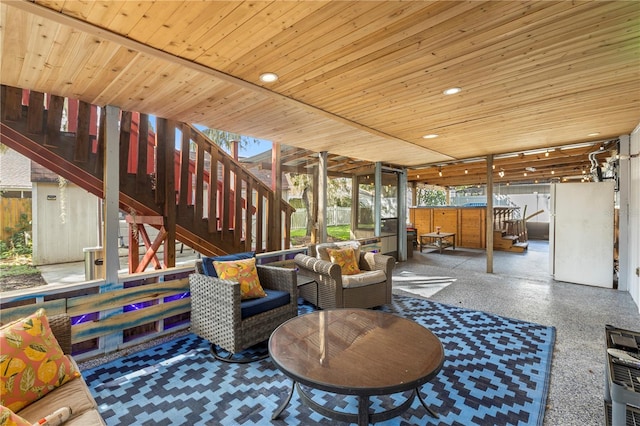 living room featuring wood ceiling