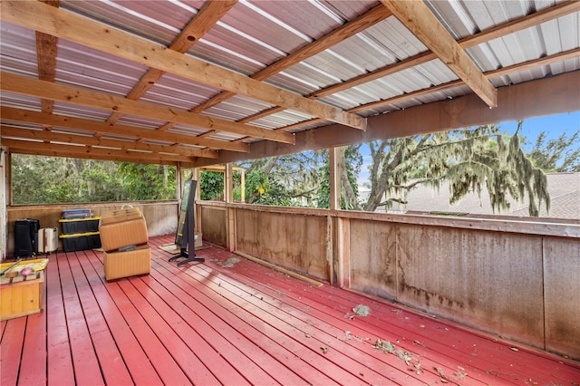 wooden deck featuring a hot tub