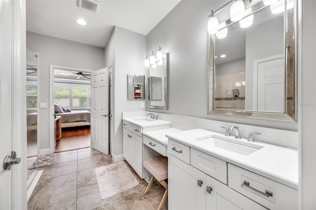 bathroom featuring vanity, ceiling fan, wood-type flooring, and walk in shower