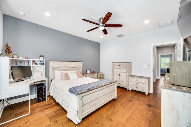 bedroom featuring hardwood / wood-style floors and ceiling fan