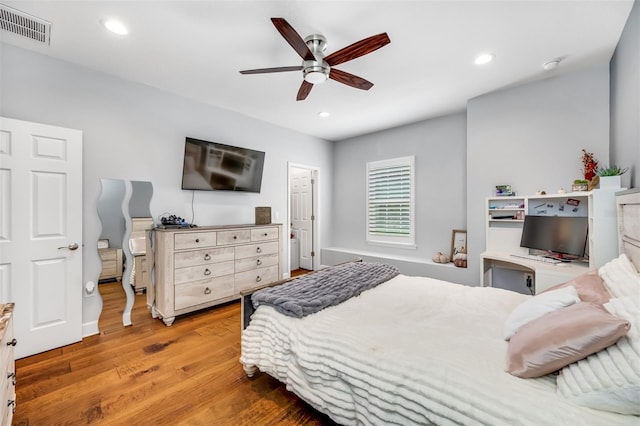 bedroom featuring wood-type flooring and ceiling fan