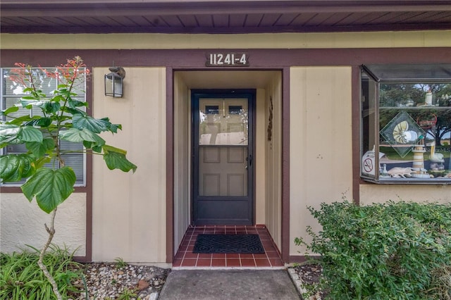 property entrance featuring covered porch