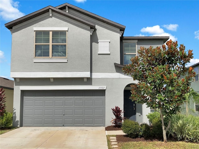 view of front of property featuring a garage