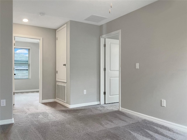 unfurnished bedroom featuring carpet floors