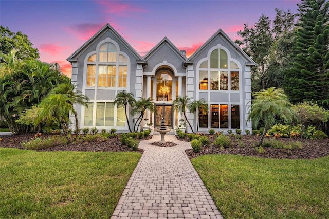 view of front of home featuring a yard