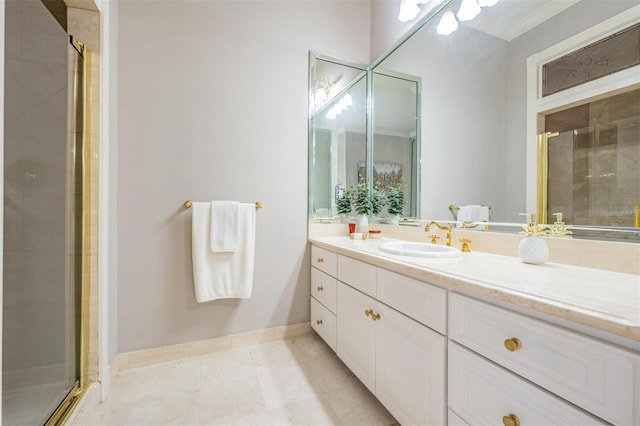 bathroom featuring tile patterned floors, a shower with door, and vanity