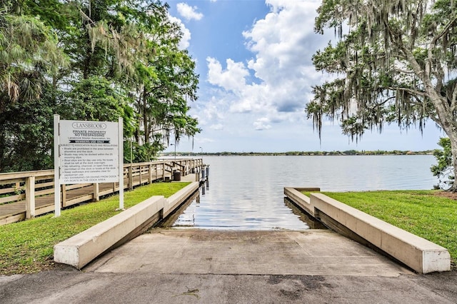 dock area featuring a water view