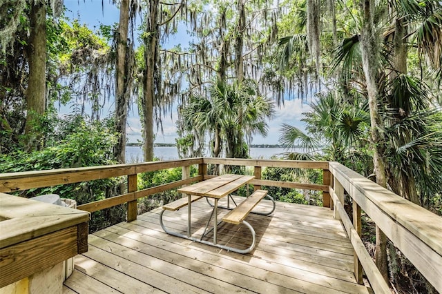 deck featuring a water view