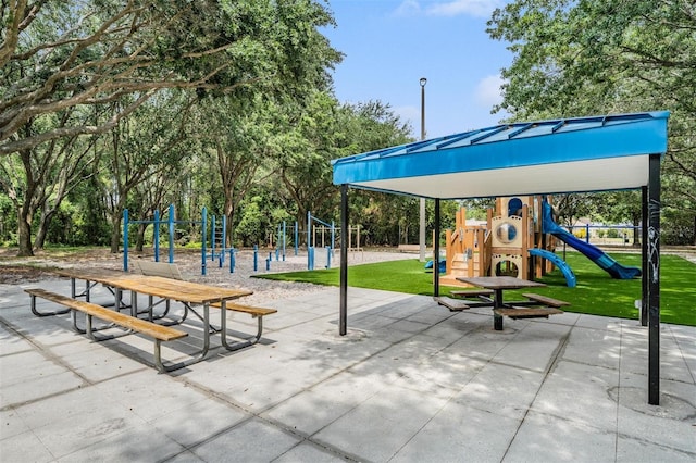 view of home's community with a playground