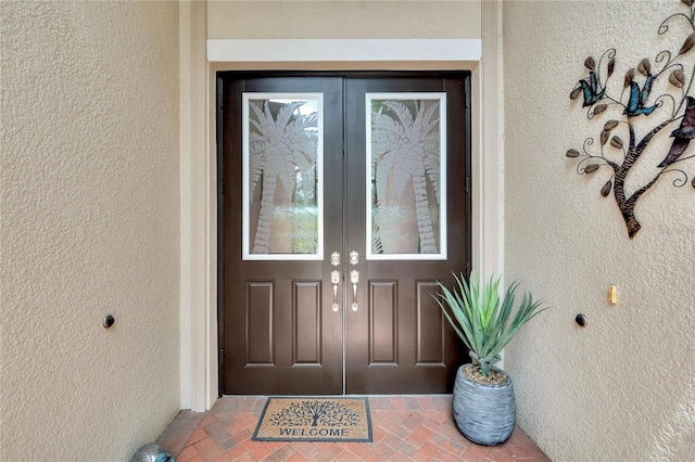 view of exterior entry with french doors