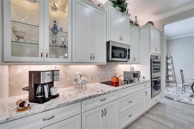 kitchen featuring white cabinets and stainless steel appliances