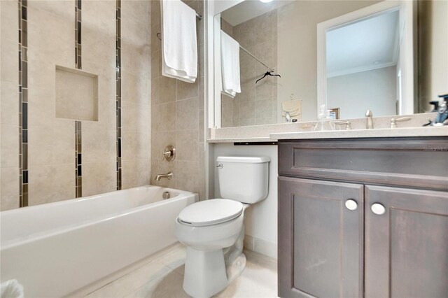 full bathroom with vanity, toilet, and tiled shower / bath combo