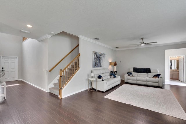 living room featuring crown molding, dark hardwood / wood-style floors, and ceiling fan