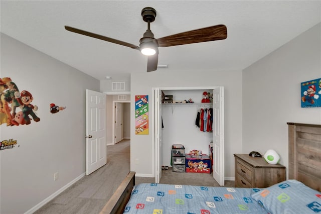 carpeted bedroom with a closet and ceiling fan