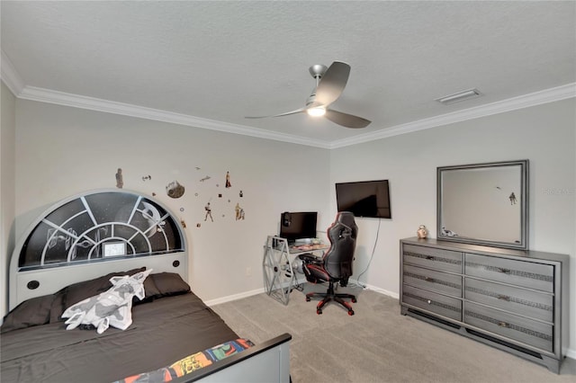 carpeted bedroom featuring ornamental molding, ceiling fan, and a textured ceiling