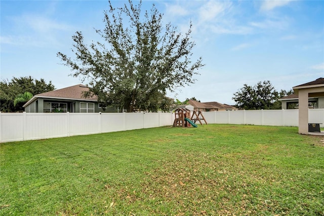 view of yard with a playground