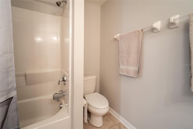 bathroom with shower / tub combo, toilet, and tile patterned floors