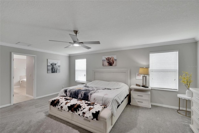 bedroom featuring ornamental molding, connected bathroom, ceiling fan, and light colored carpet