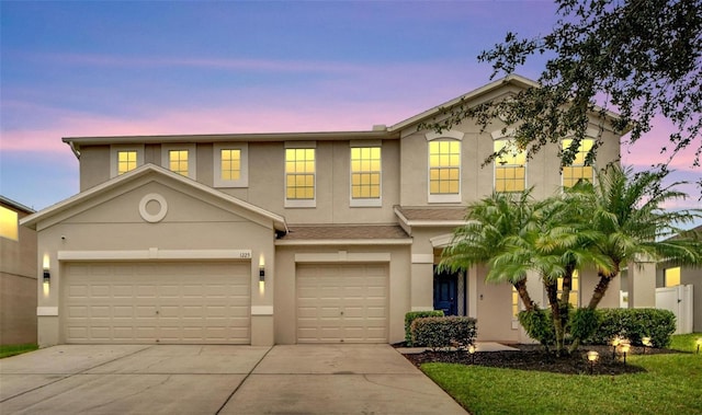 view of front of home with a garage