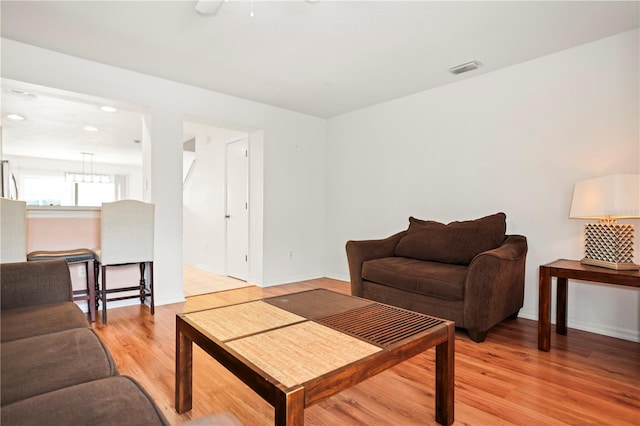 living room with light hardwood / wood-style floors