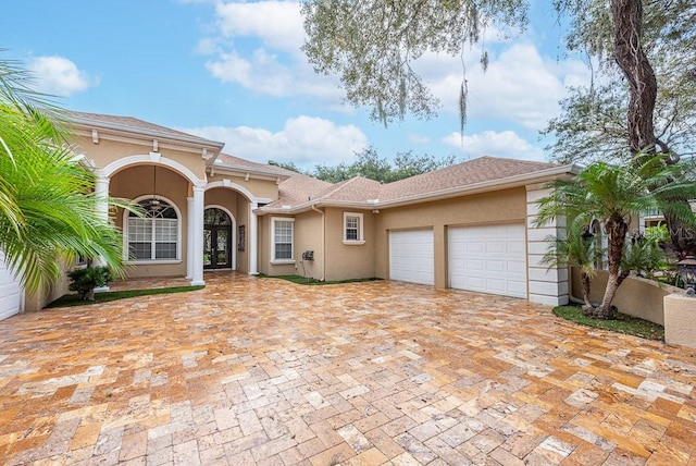 view of front of property with a garage