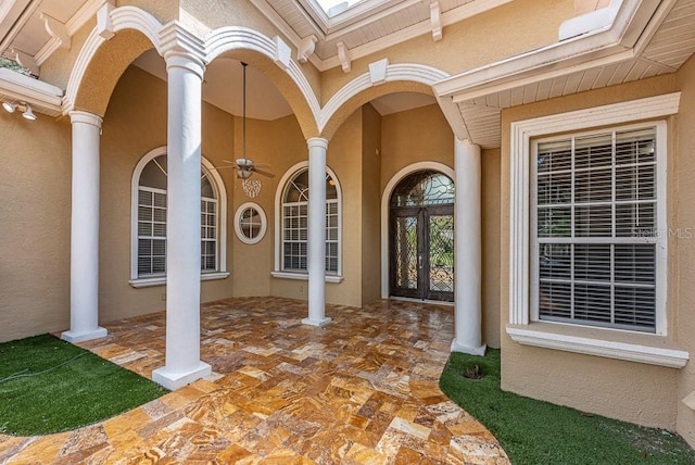 entrance to property with a patio