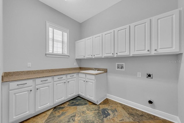 laundry room with hookup for a washing machine, sink, electric dryer hookup, and cabinets