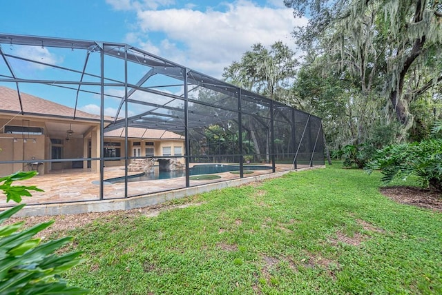 exterior space featuring a patio and glass enclosure