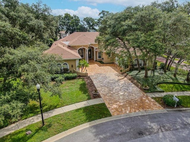 exterior space featuring a front lawn