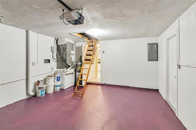 garage with electric panel, a garage door opener, and water heater