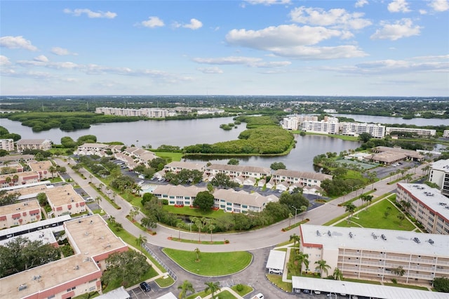 drone / aerial view with a water view