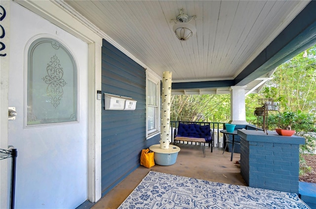 view of patio featuring covered porch