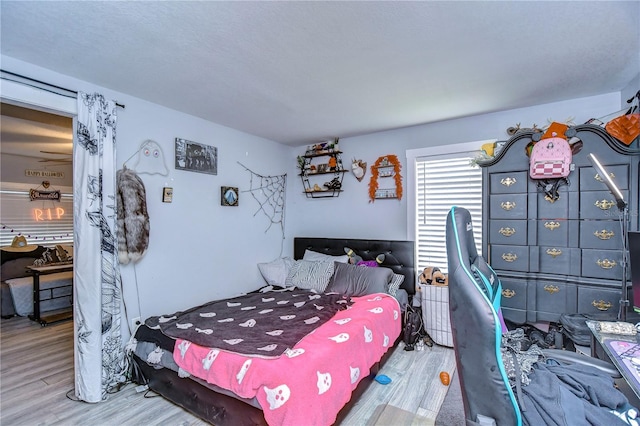 bedroom featuring hardwood / wood-style floors