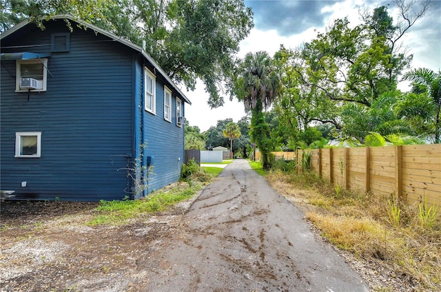 view of home's exterior with cooling unit