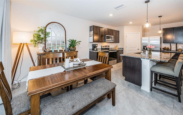 8367 Ender Hills Dr, Wesley Chapel, FL 33545 - dining space featuring recessed lighting and light tile patterned floors