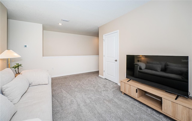 8367 Ender Hills Dr, Wesley Chapel, FL 33545 - living room featuring carpet flooring, baseboards, and recessed lighting