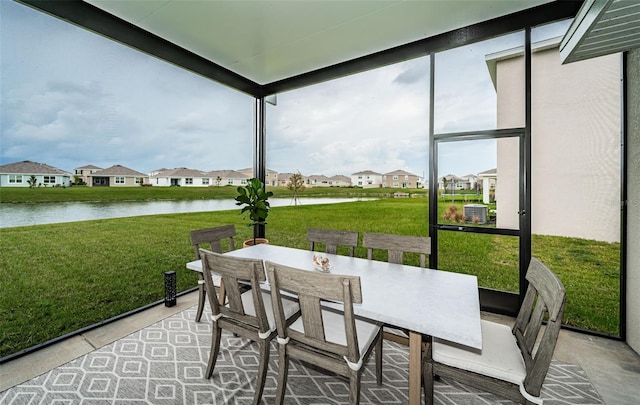 8367 Ender Hills Dr, Wesley Chapel, FL 33545 - sunroom with a residential view and a water view