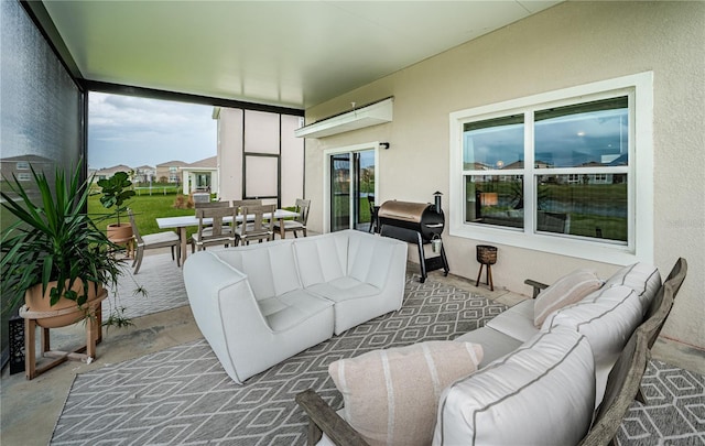 sunroom featuring a wealth of natural light